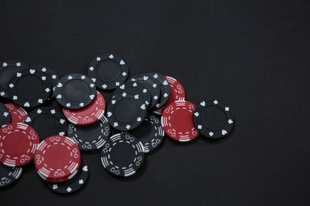 poker chip sets in a black background